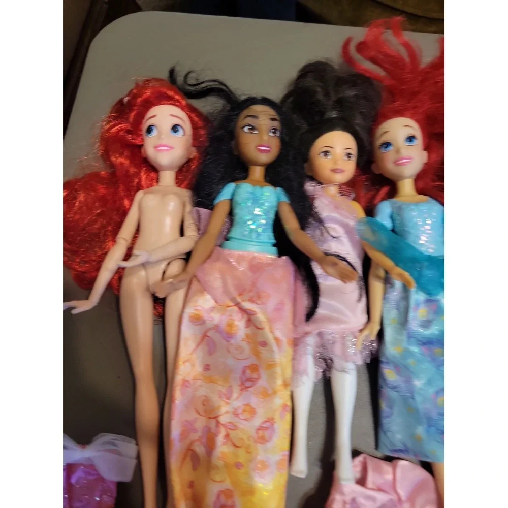Disney Barbie dolls with extra dresses shoes etc... Mixed lot